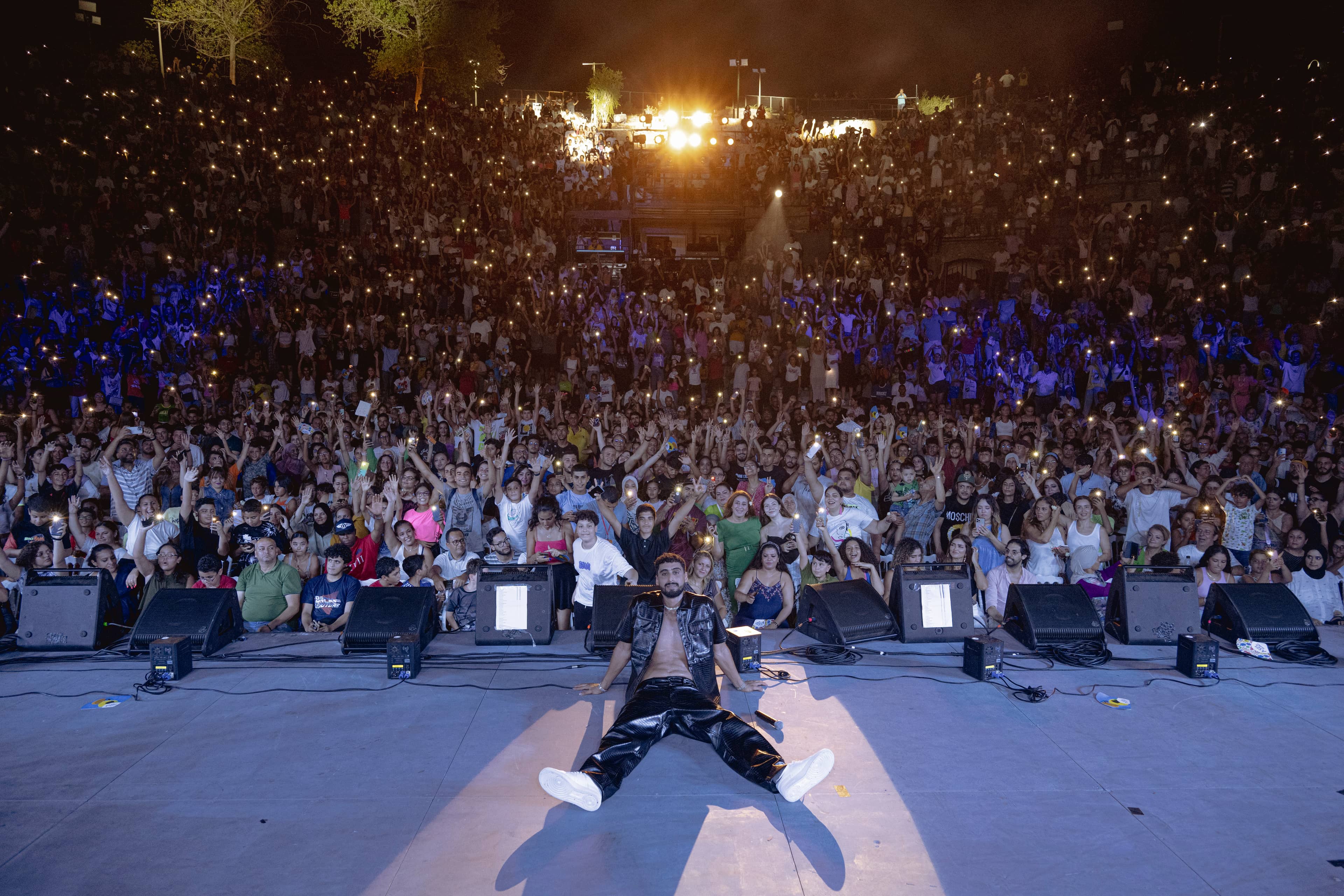 A.L.A on stage in front of a full crowd